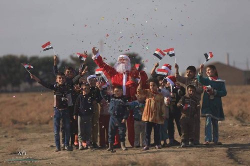 Images ... Santa Claus is celebrated with displaced people and security forces in Mosul