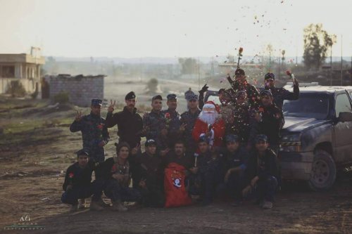 Images ... Santa Claus is celebrated with displaced people and security forces in Mosul
